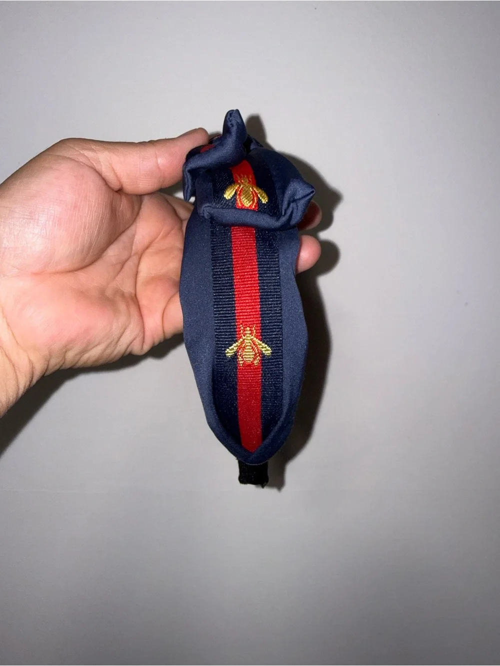 Navy Knotted Silk-Style Headband with Red & Yellow Accents